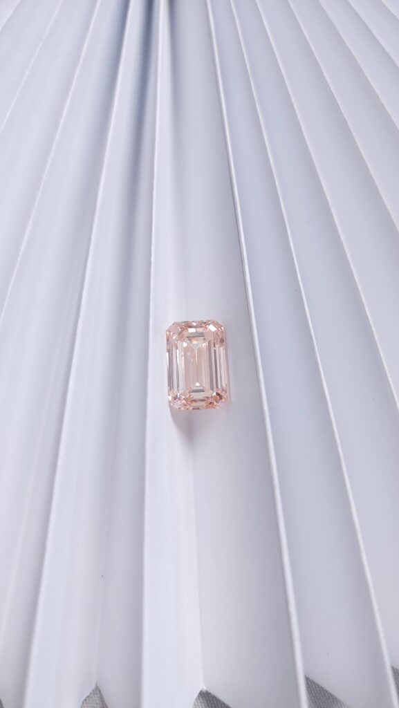 Shades fancy lab-colored pink diamond | pink emerald cut diamond