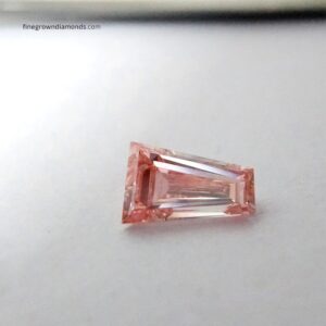 Pink trapezoid cut diamond closeup