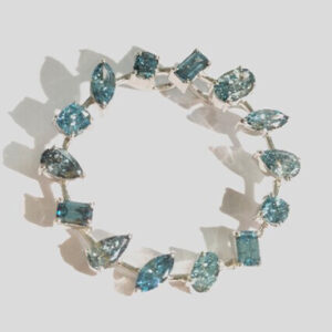 Silver bracelet with blue gemstones.