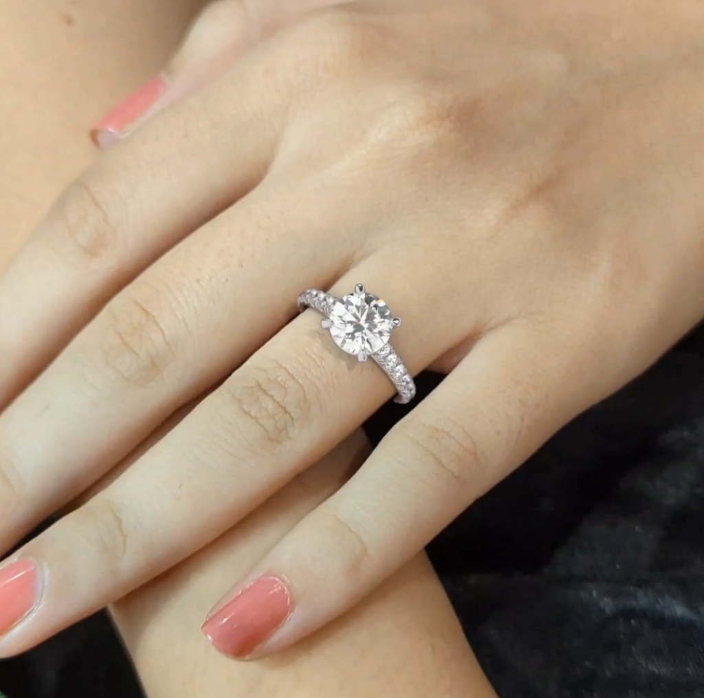 diamond ring in model hand